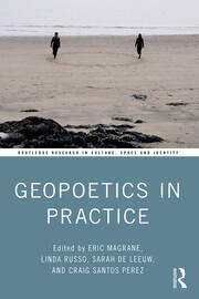 Text "Geopoetics in Practice" image of two people making a circle imprint on sand on a beach with rocks in foreground