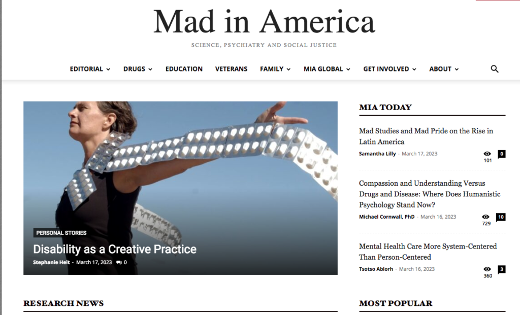 Photo of Mad in America webpage with a photo of Stephanie in black with silver mood stabilizer garb around neck, title of essay and web menu to articles on top and sides.