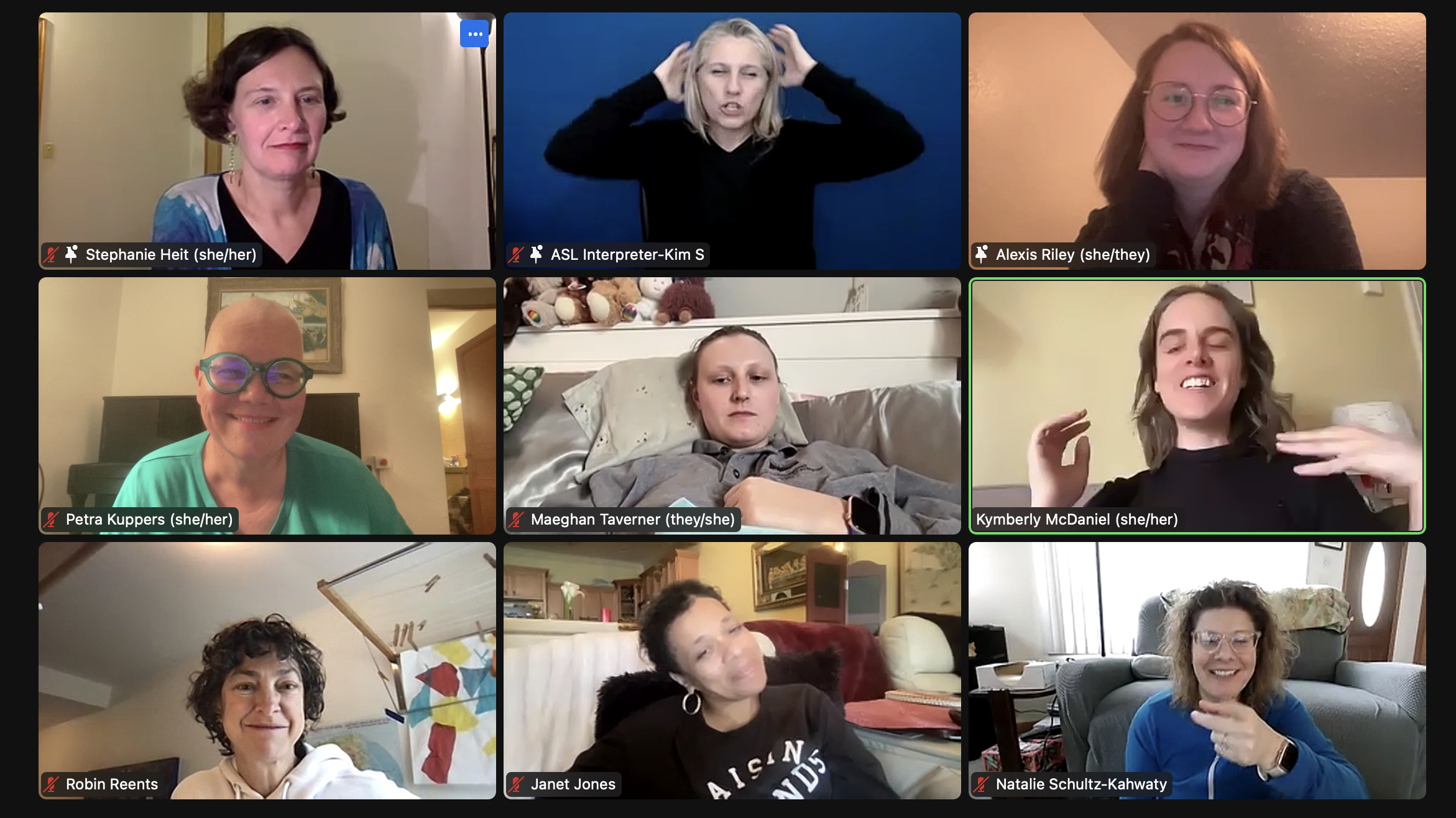 Screenshot of zoom session with nine people in zoom squares, many smiling.